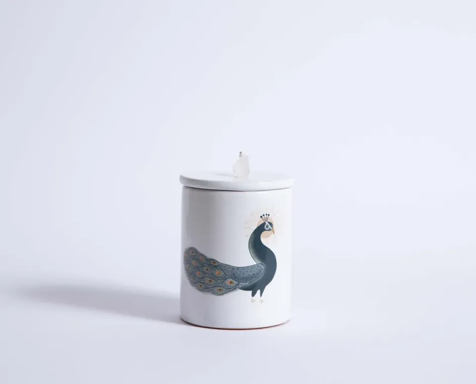 NIVA Design Totem Animals Pavone candela quarzo ialino profumata