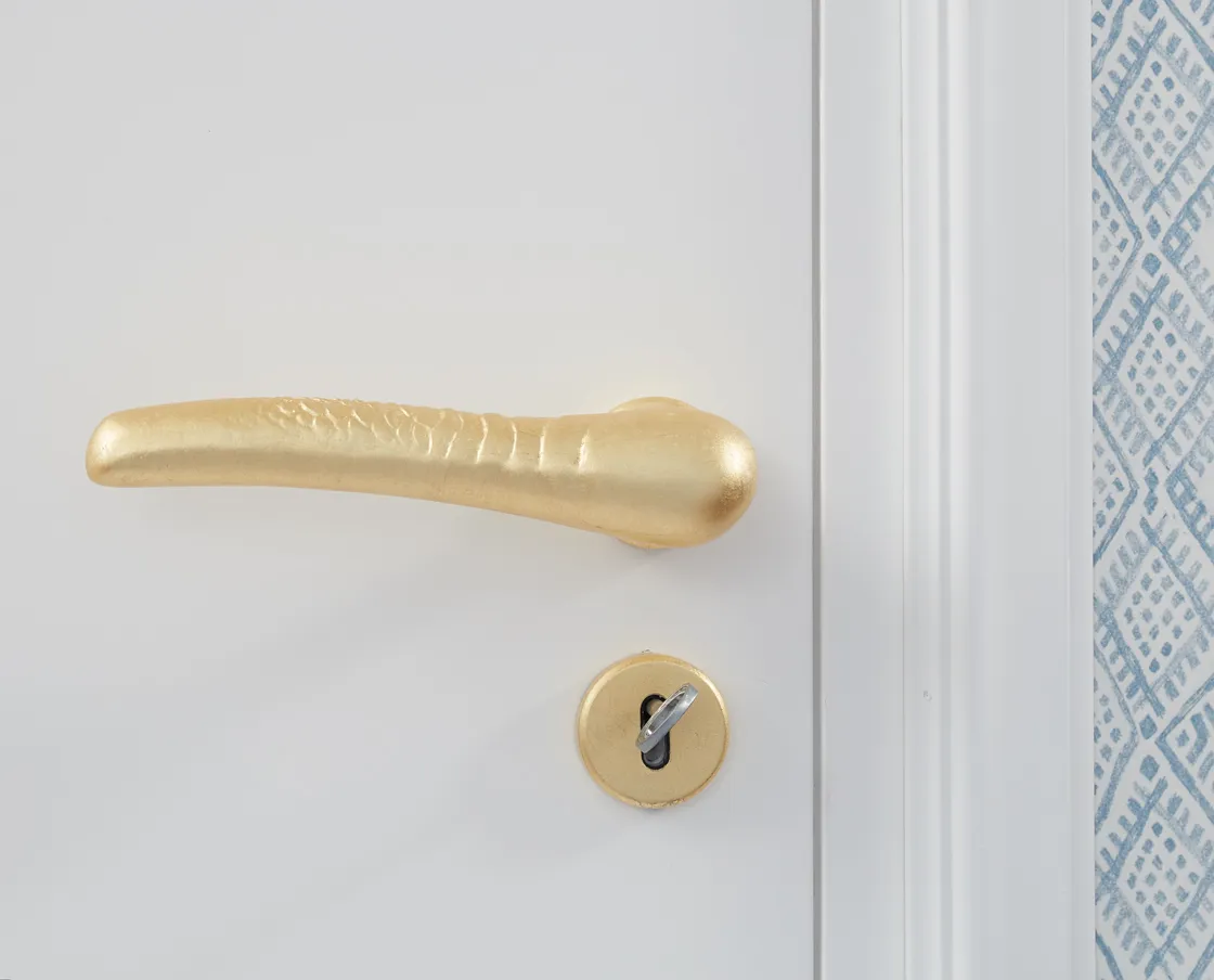 NIVA Design Scaglie maniglia oro porte lusso