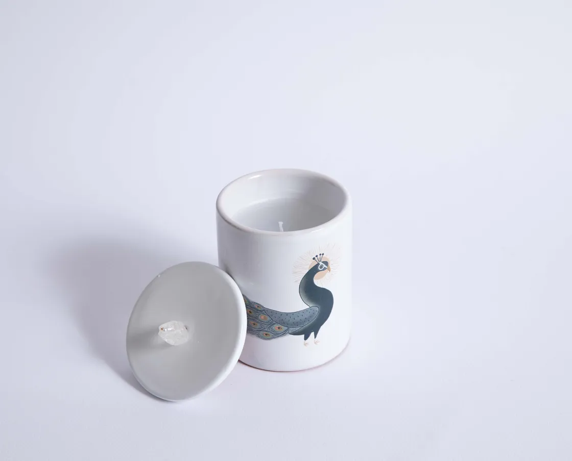 NIVA Design Totem Animals Pavone candela quarzo ialino profumata