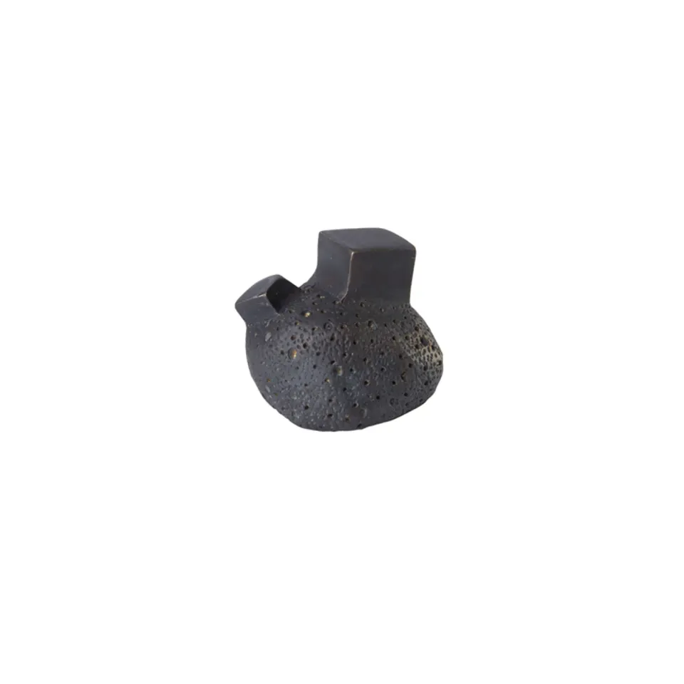 NIVA Design Pietra pomello ottone nero texture minerale